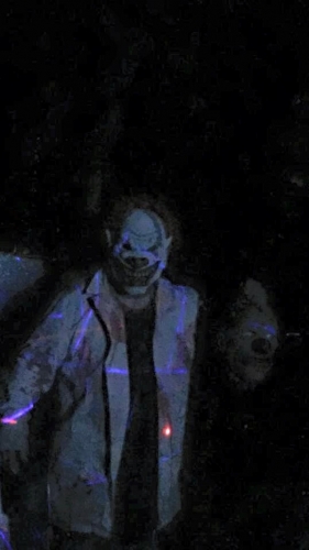 clown with beheaded victim