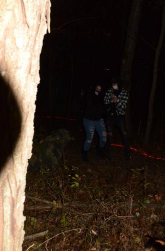 couple-walking-haunted-trail-2