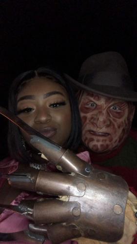 monster-posing-with-guests-outside-haunted-woods-1