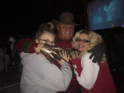 monster-posing-with-guests-outside-haunted-woods