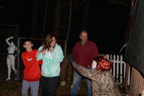 Haunted Woods Monster Reaching for Scared Visitors