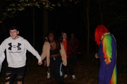Haunted Woods Clown and Running Couple