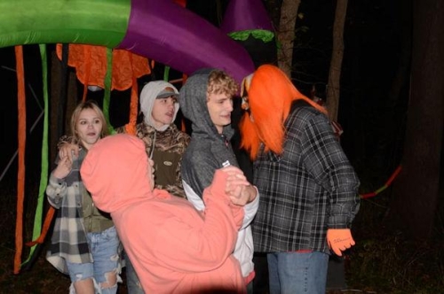 Haunted Woods Orange Clown Confronts Man