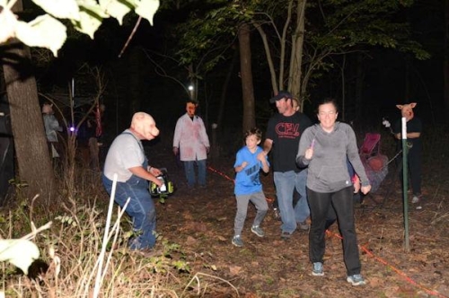 Haunted Woods Pig Man and Running Guests